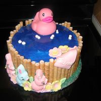 Img_2932.jpg Chocolate and yellow cake. Covered in buttercream. Surrounded by Oreo Stix cookies. MFF decorations and rubber ducky. Thanks to my2rys for...