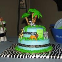 Jungle This is a cake I made for a baby shower for my cousin. They are doing jungle theme. Vanilla cake, buttercream icing. Trees are Royal icing...