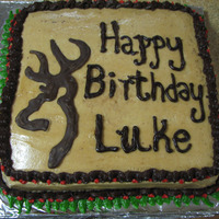 Browning Symbol Birthday Cake Cake for my son's 20th...He loves the Browning symbol or brand...Chocolate Cake ..peanut butter buttercream icing.