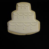 Wedding Cake Cookies These are wedding cake cookies that I made for a friend at work. They are NFSC with Royal Icing.