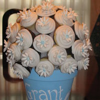 Mini Cupcake Flower Pot This was made for a baby shower. The daisies are mmf. Painted the pot and added the baby's name! Thanks for looking!