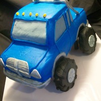 Redneck/monster Truck this is my version of a redneck/monster truck, first time making a cake like this. Cake is covered in buttercream icing with mmf/gumpaste...