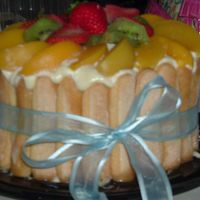 Tropical Charlotta I MADE THIS CAKE FOR MY FRIENDS AT WORK, I PUT ON THE INSIDE KIWIS, STRAWBERRIES,PEACHES, CARAMBOLAS(STARFRUITS)AND RAMBUTAN(I THINK THEY...