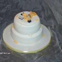 Wedding/ Anniversay Bottom cake vanilla with strawberry filling and top is vanilla with ganache filling. EVERYTHING went wrong with this cake! Bulged, filling...