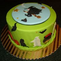 Halloween Cake Cake decorations made with gum paste & over all frosting fondant.Decorations were made using the cutters Nicholas Lodge sells or Global...