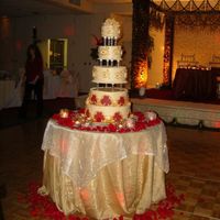 Indian Style Wedding Cake Over all frosting Italian butter cream. Scroll and baroque design made with gum paste ( I added Tylose) and painted with super gold luster...