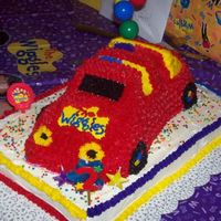 Wiggles Big Red Car cake for my nephew's 2nd birthday. I used the Wilton VW pan and made some slight adjustments to make it a convertible. BC...