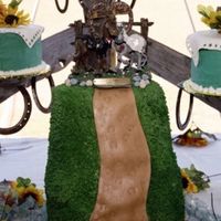 Hillcake.jpg Detail photo of the hill that was built for the "Elmer and Ellie Gettin' Hitched" horse figureines. Cake is 12 layers...