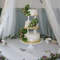 My 2Nd Wedding Cake, But This One Was For Real This cake was made for my brother's wedding. As requested, it was white cake with raspberry filling, covered in off white marshmallow...