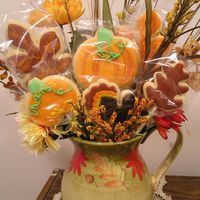 Fall Bouquet This was a thanksgiving project i did I'm a little late in getting my pics in. They are sugar cookies w/poured icing and silk flowers...