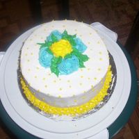 100_0854.jpg This was my final cake for Wilton Class I. I had a hard time with the roses, but they turned out okay.