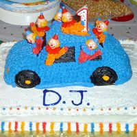 Clown Car This is my first attempt at a 3D cake. I got the idea from a Wilton year book. The sheet cake is filled with barvarin creme filling and the...