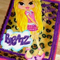 Bratz Cake - Cloe This is another fondant painting I have done. I airbrished the background like a leopard print and used grass tip 233 for the fuzzy border...