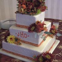 Matthews - Hunt Wedding 6", 9" and 12" square cakes. Covered in ivory fondant and ivory sugar pearls. Ribbon border. Entire cake covered in ivory...