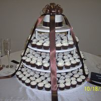 Hinson-Nale Cupcake Wedding Cake I was soooo excited about doing my very first cc wedding cake! 250 mini cupcakes in strawberry, milk chocolate and french vanilla. The...