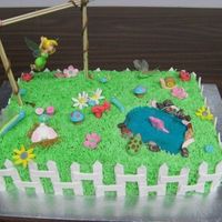 Tinkerbell Garden Cake for my daughter's 6th birthday. Her only request was that Tinkerbell be flying.