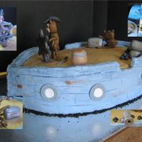 Avast Ye Monkey!! Composite photo of pirate monkey cake. chocolate cake buttercream icing fondant monkeys and accessories. Mast made of breadstick inserted...