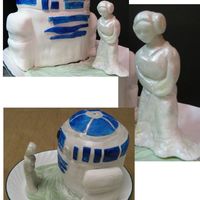 Help Me Obi-Wan! stacked chocolate cakes (two six inch rounds on top of one seven inch round) sculpted and covered in fondant. painted gum paste decals....