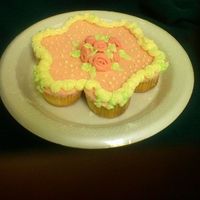 Flower Cake CCC made from white almond sour cream cake with buttercream trimming and leaves. Rbbon roses made from mmf. Thanks for looking!