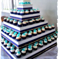 Beach Wedding Royal ribbon w/ raffia wrap for a beach themed wedding. I made 'sea glass' candy for the cupcake toppers. tfl!