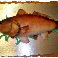 Spot Tail Bass Groom's Cake Hi all! This was done for a groom who loves fishing. Devil's foodcake and covered in fondant. Then veined and airbrushed. TFL!!