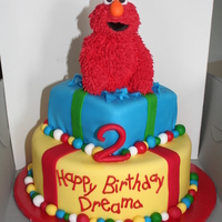 Elmo This cake was for my great niece. Elmo was made out of RKT and piped with royal icing.