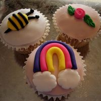 Spring Cupcakes! White cupcakes with BC icing, and fondant decorations.