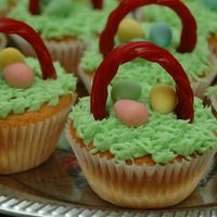 Easter Basket Cupcakes A white cake with buttercream icing, Twizzlers and Mini Eggs.