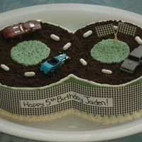 Race Car Track Birthday Cake! 2-8" white cakes with a bc icing and fudgeo track!