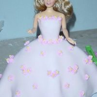 Doll Cake This was my first time using both fondant and royal icing. I think it turned out ok for being my first experience.