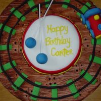 Drum/train Cake I made this cake for a 2 year olds birthday. His mom couldn't decide between trains and drums, so I used them both!