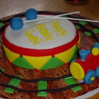 Side View Of Drum/train Cake 