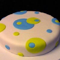 Polka Dot This is my first cake that was made from scratch. and my first fondant work. i think i did an ok job, and had alot of fun doing it!!!!