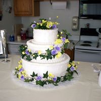 Lavender Sunshine Classic white cake with fresh strawberry filling; buttercream icing; gum paste flowers... a pure joy to prepare
