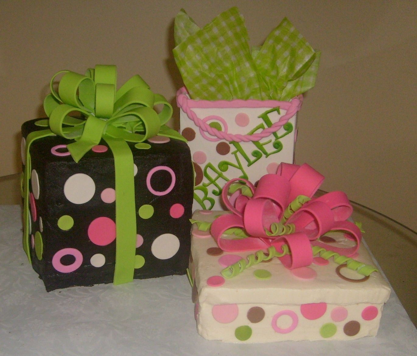 3-D Box Cakes With Fondant Bag fondant bows, fondant gift bag. this cake was made as a house warming party fo a very dear friend.