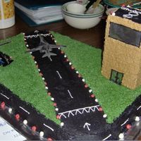 Airplane Cake Airplane for a boys 8th bday, planes are toys, buttercream, tower is a decorated foil wrapped box