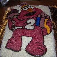 Elmo Party Cake This cake was a french vanilla double layer. All frosting was buttercream. This was my baby's 2nd birthday cake.