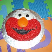Elmo Cake My twin nephews were very into Elmo so I made them an Elmo birthday cake. I used the Elmo character pan. I don't care for how the star...
