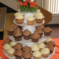 Cupcake Tower This is a cupcake tower I made for an open house wedding reception my husband's family threw for us in his hometown. There was...