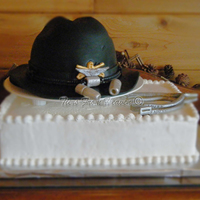 Cavalry Cake White and chocolate cake with chocolate mousse filling. Cavalry hat decorated in fondant with fondant details. This cake was made for a...