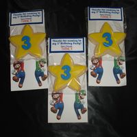 Mario And Luigi Cookies Made as favors for my 3 year old's birthday party. No Fail Sugar Cookies with buttercream fondariffic fondant melted on warm cookie....