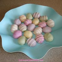 Easter Egg Cake Balls White cake with buttercream icing cake balls, dipped in pastel colored chocolate to TRY to make them look like Easter eggs. Made 60 of them...