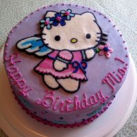 Mia's Hello Kitty Cake White cake with raspberry filling and buttercream. Frozen buttercream transfer for Hello Kitty...and it worked this time! My last 2 didn&#...