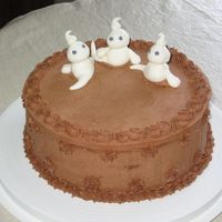 Chocolate Ghost Cake Just playing around with fondant and thought these little guys were cute.