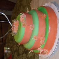 Anniversery Cake Chocolate cake filled with peach buttercream. My first fondant flowers.