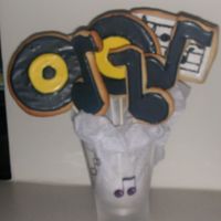 Music Cookie Bouquet records, music notes, and sheet music cookie covered in RI