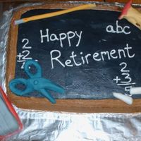Retirement_Cake.jpg I made this for my mother-in-law. Today is her last day of teaching so we are getting together to have a little party for her. Probably can...
