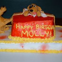 Puppy Surprise I made this cake for my daughter's birthday. I got the idea from another cake here on cake central (only it was a horse and individual...