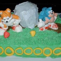 Sonic And Tails Cake I made this for my son's 8th birthday. The characters and small "chaos emeralds" are made from mmf. The big "emerald&...