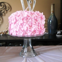 Blossom Baby Shower Cake This a baby shower cake that I did for my sister. The 6 inch "cake" is made out of Rice Krispies because she really likes them. I...